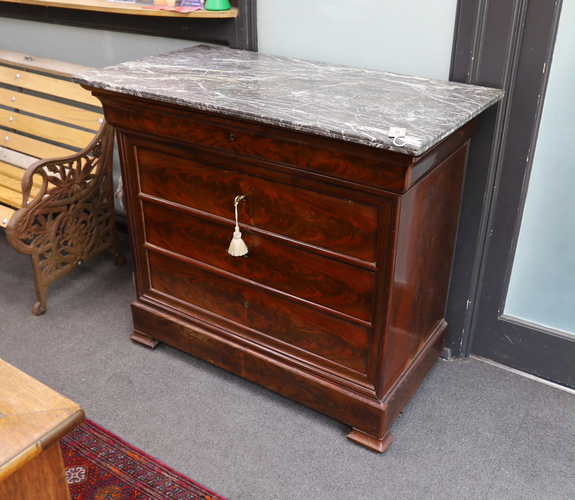 A 19th century French marble top mahogany commode, width 110cm, depth 57cm, height 96cm